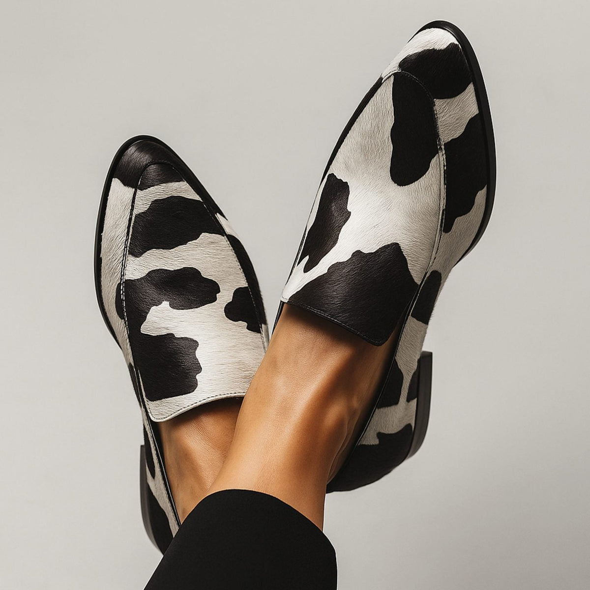 Women's Pointed-Toe Loafers with Cow Print Slip-On Design